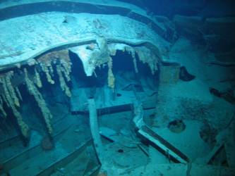 Large pieces of twisted steel plate and ribs on seabed